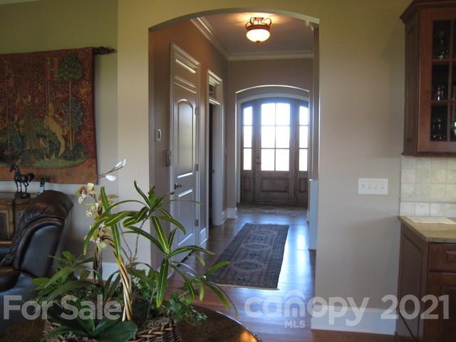 352 Windflower Ln Mill Spring Tryon, NC 28782 - Photo 33 of 43 a living room with furniture and a potted plant