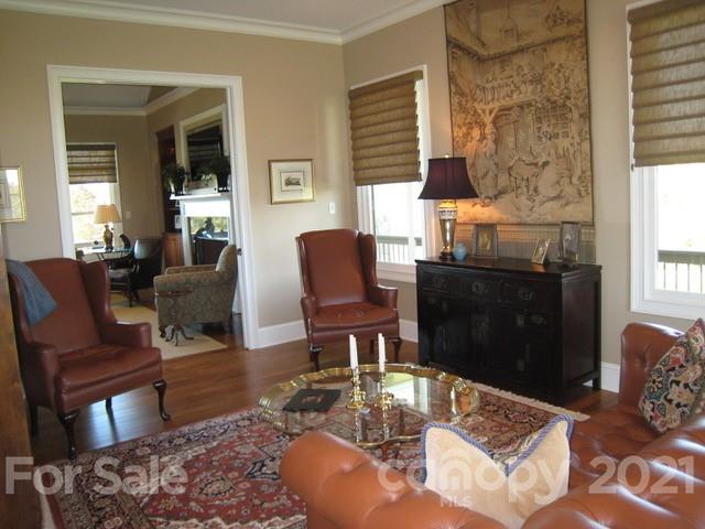 352 Windflower Ln Mill Spring Tryon, NC 28782 - Photo 34 of 43 a living room with furniture rug and window