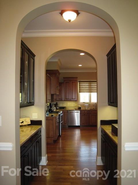 352 Windflower Ln Mill Spring Tryon, NC 28782 - Photo 35 of 43 a kitchen with a refrigerator and a stove top oven