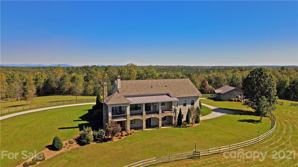 352 Windflower Ln Mill Spring Tryon, NC 28782 - Photo 39 of 43 a view of a swimming pool with an ocean view