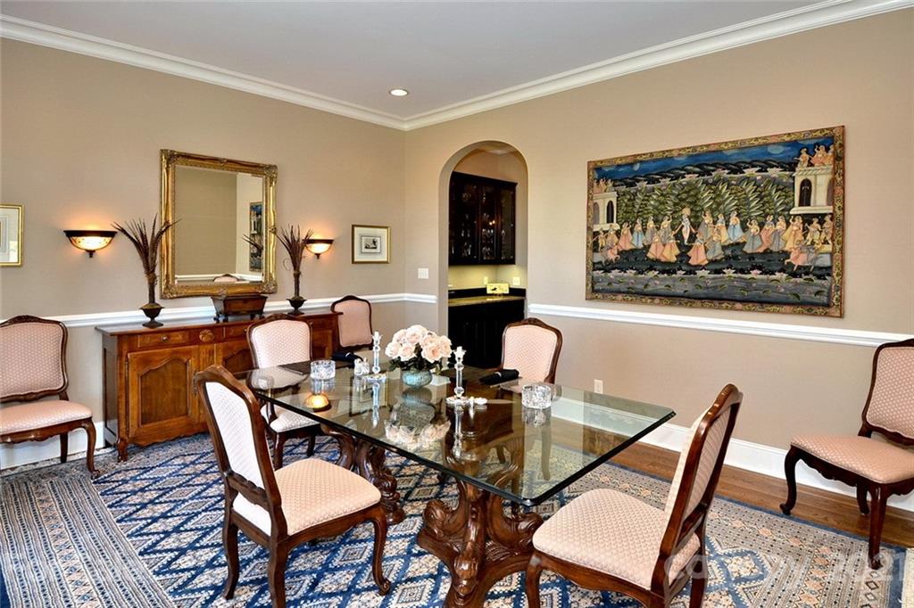 352 Windflower Ln Mill Spring Tryon, NC 28782 - Photo 7 of 43 a dining room with furniture and wooden floor