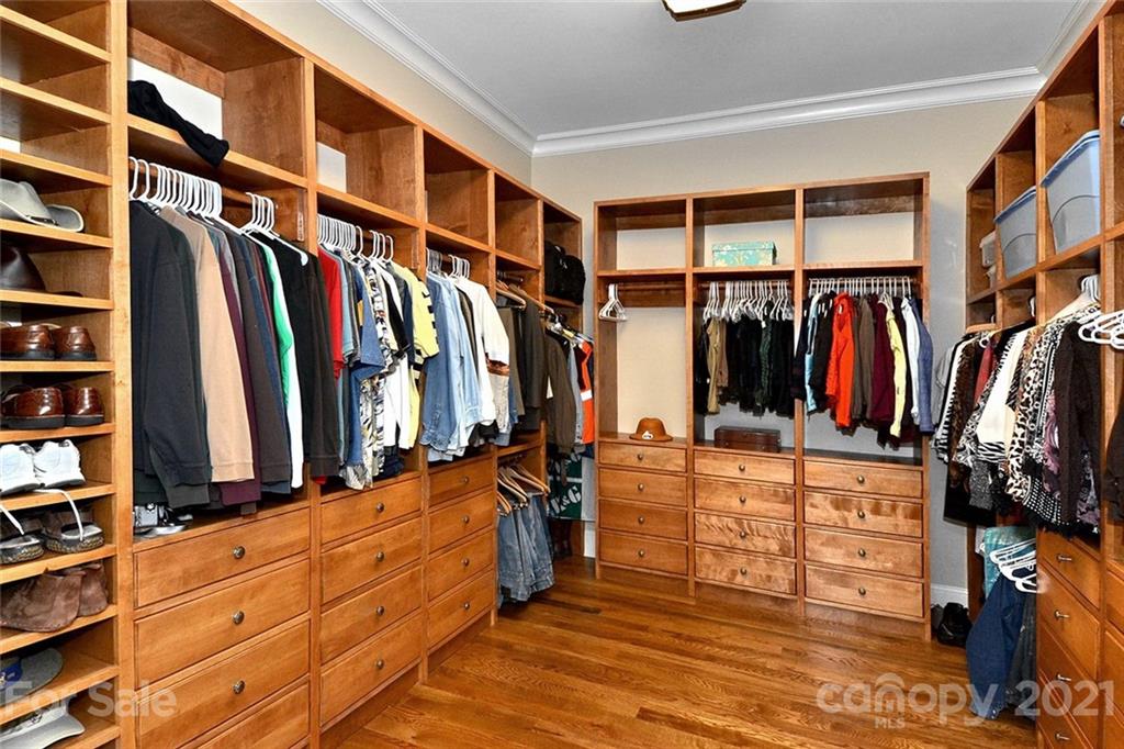 352 Windflower Ln Mill Spring Tryon, NC 28782 - Photo 10 of 43 a view of walk in closet with clothes and shoes