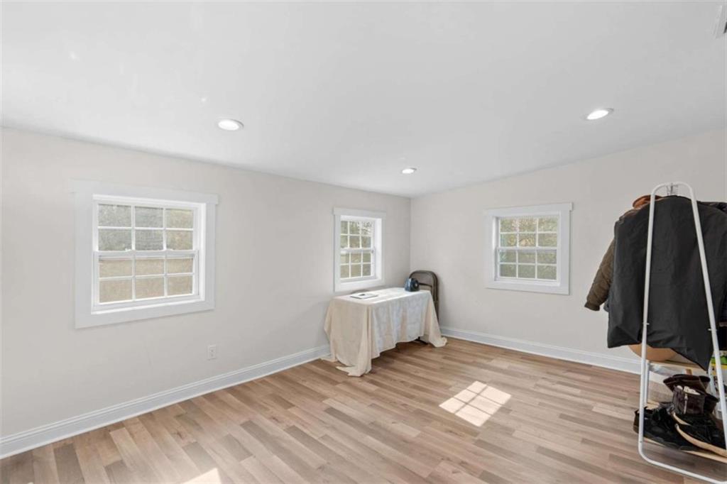 1220 South Hampton Road Hampton, GA 30228 - Photo 24 of 30 a view of a room with gym equipment and a window