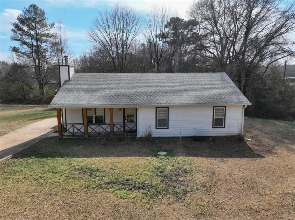 1220 South Hampton Road Hampton, GA 30228 - Photo 28 of 30 a front view of a house with garden