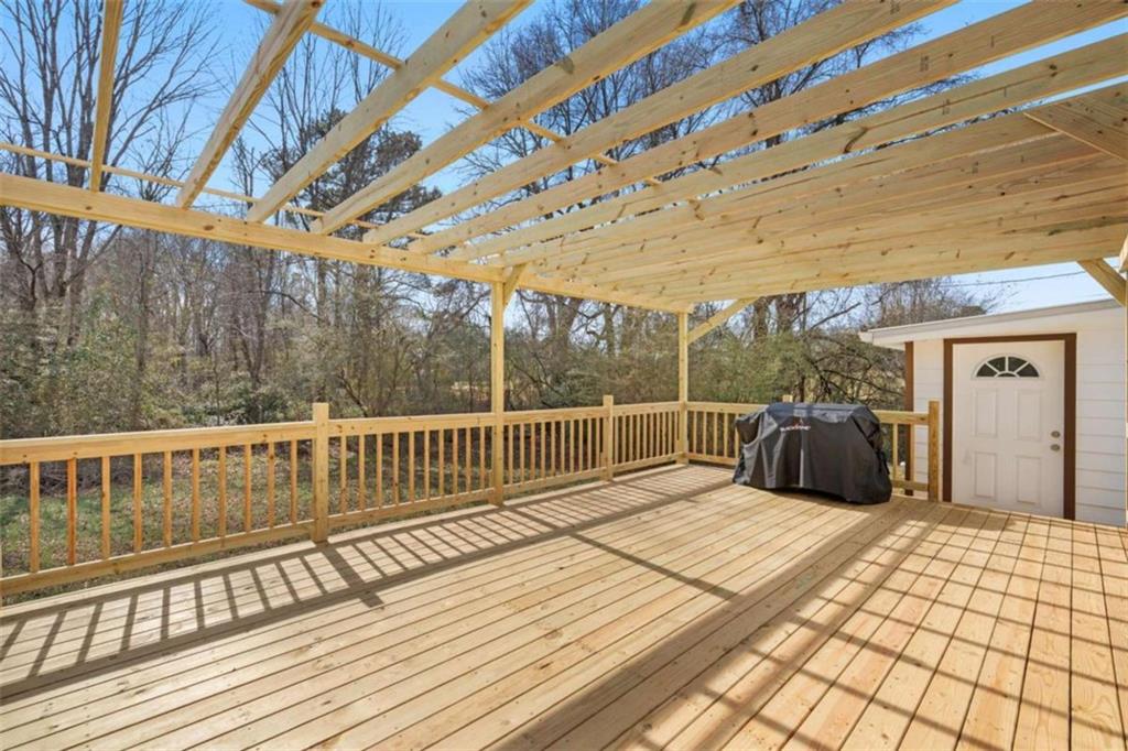 1220 South Hampton Road Hampton, GA 30228 - Photo 29 of 30 a view of balcony with wooden floor