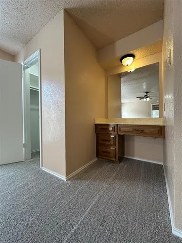 a bathroom with a toilet a sink and bathtub