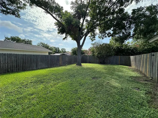 a view of backyard of house