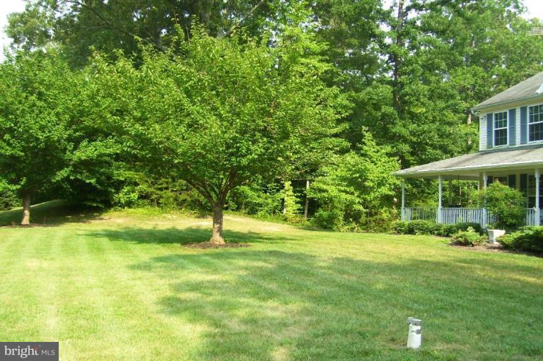 611 Small Reward Road Huntingtown, MD 20639 - Photo 6 of 28 front yard