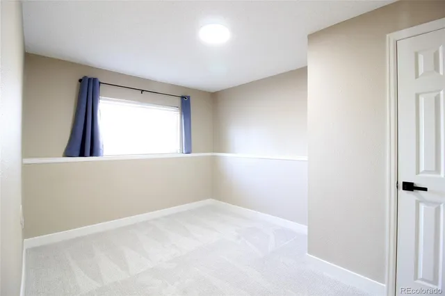 an empty room with a window