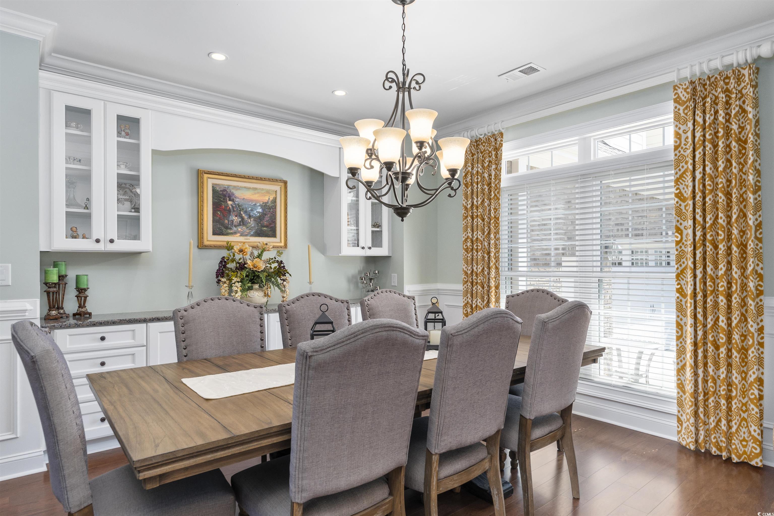 63 Grey Moss Road Murrells Inlet, SC 29576 - Photo 5 of 35 Dining space with visible vents, an inviting chand