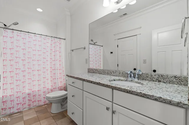 a bathroom with a sink and a vanity