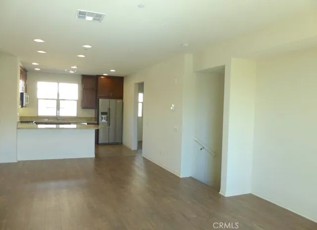 a view of kitchen with wooden floor