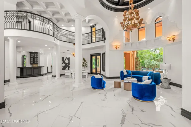 a kitchen with stainless steel appliances granite countertop a sink and a refrigerator