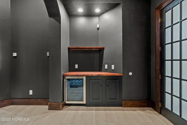 a front view of a house with a swimming pool