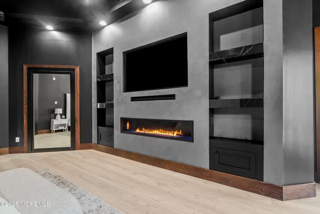 an aerial view of a house with a yard and garden