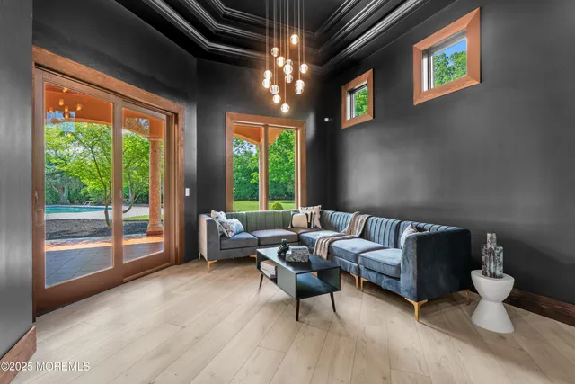 an aerial view of residential houses with outdoor space and river