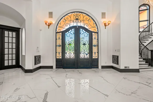 a kitchen with stainless steel appliances granite countertop a stove and a sink