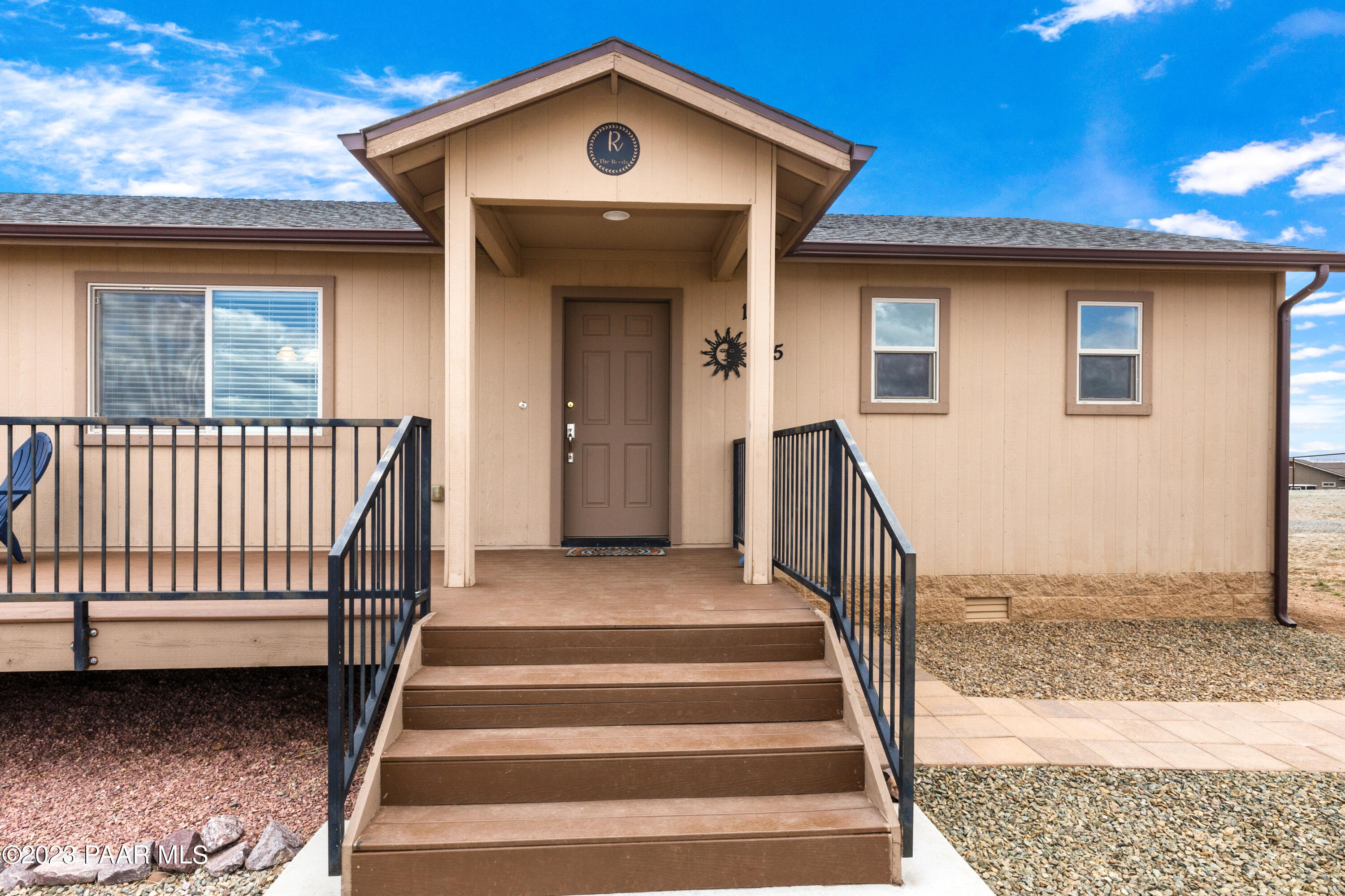 1475 Saddle Road Paulden, AZ 86334 - Photo 3 of 25 a front view of a house with stairs