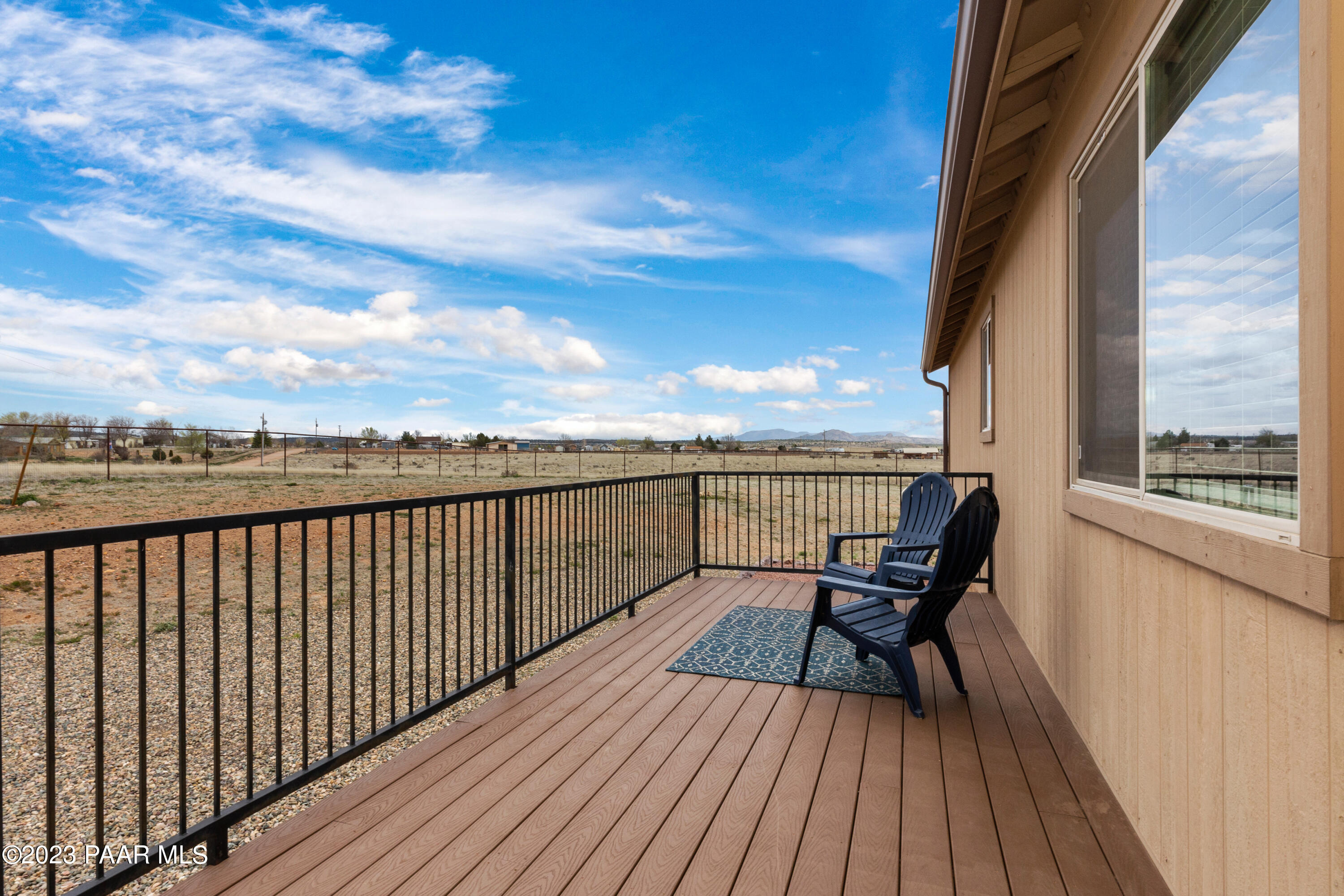 1475 Saddle Road Paulden, AZ 86334 - Photo 4 of 25 a view of a balcony with wooden floor