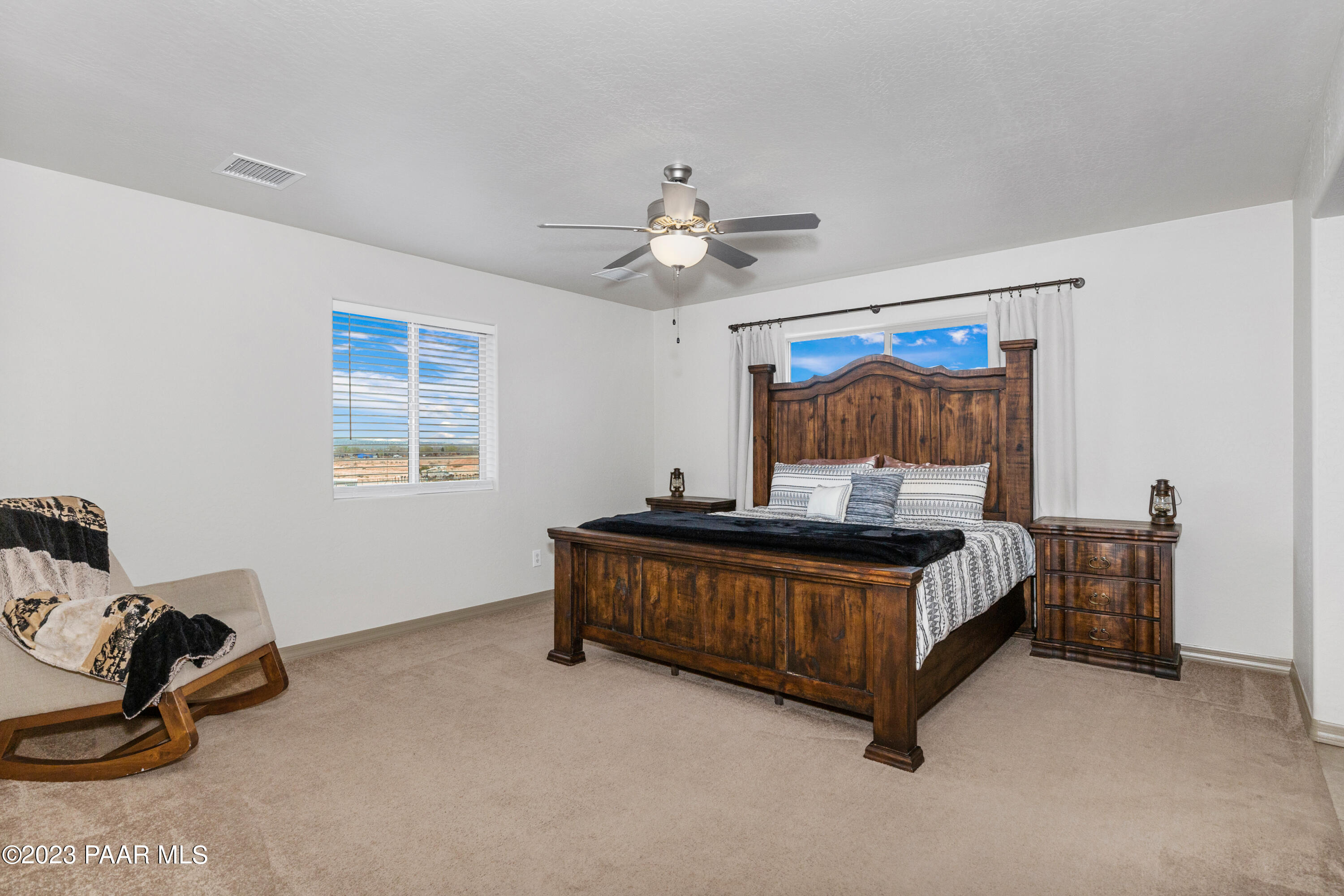 1475 Saddle Road Paulden, AZ 86334 - Photo 10 of 25 a bed room with furniture and a window