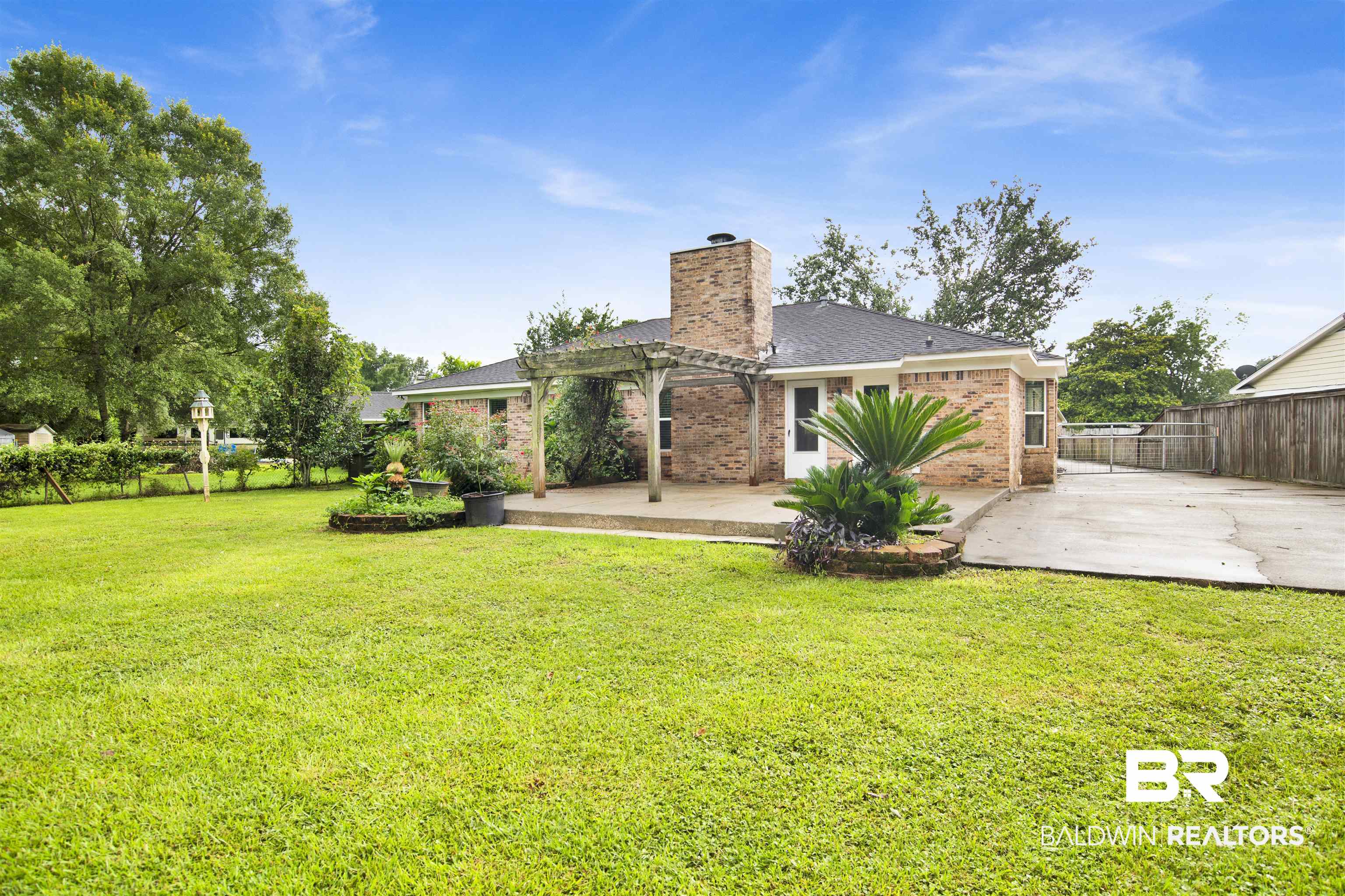 3011 Olde Gate Road Mobile, AL 36695 - Photo 33 of 35 View of yard featuring a patio area and a pergola