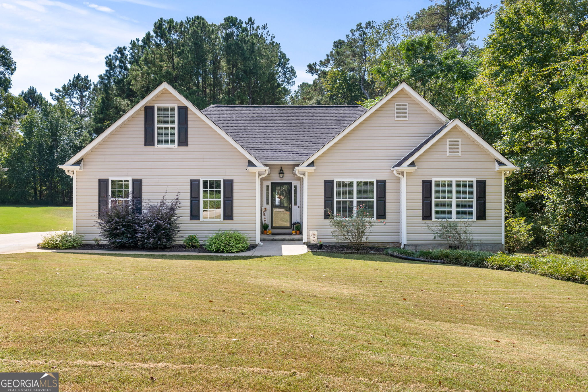 1236 County Line Road Griffin, GA 30224 - Photo 1 of 1 a front view of a house with a yard
