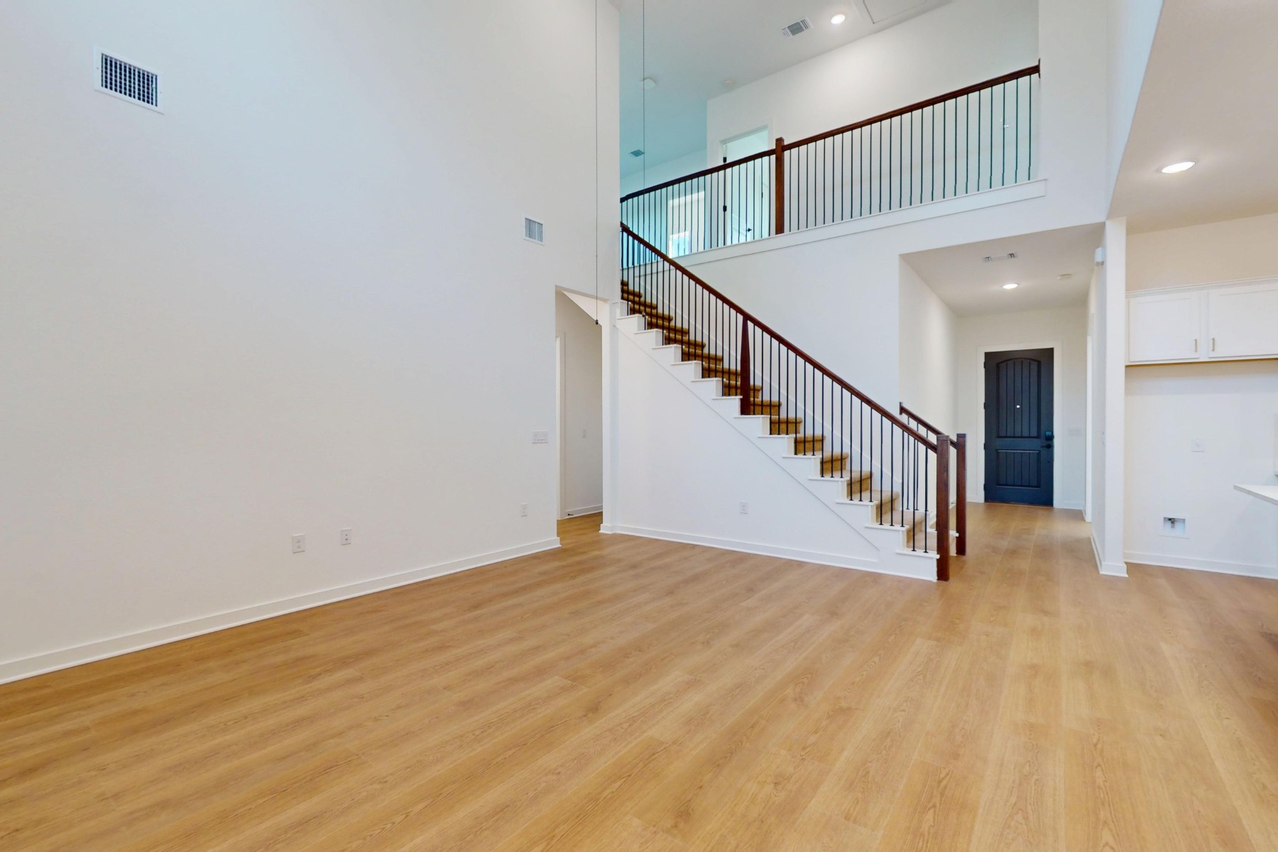 3613 Helena Way Leander, TX 78641 - Photo 13 of 27 a view of entryway with wooden floor