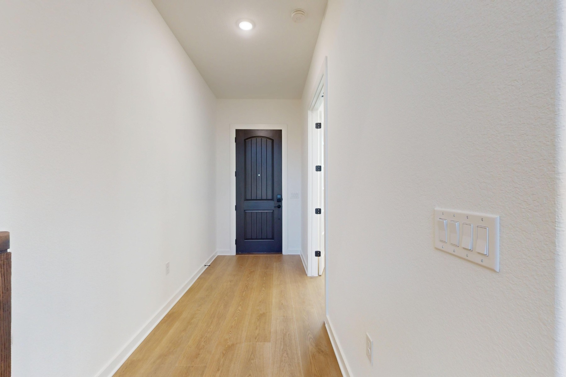 3613 Helena Way Leander, TX 78641 - Photo 2 of 27 a view of a room with wooden floor and brick walls