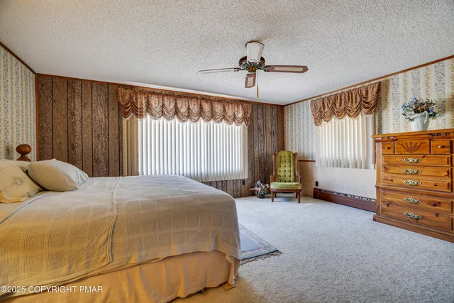 a view of a porch with wooden floor and outdoor space