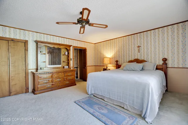 a view of a dining room with furniture and window