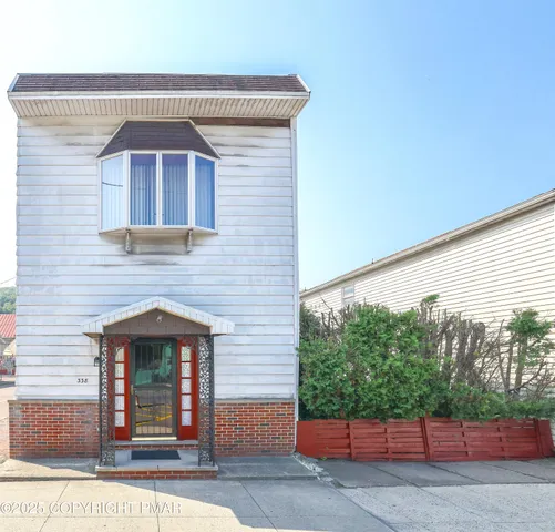 a view of a building with a street