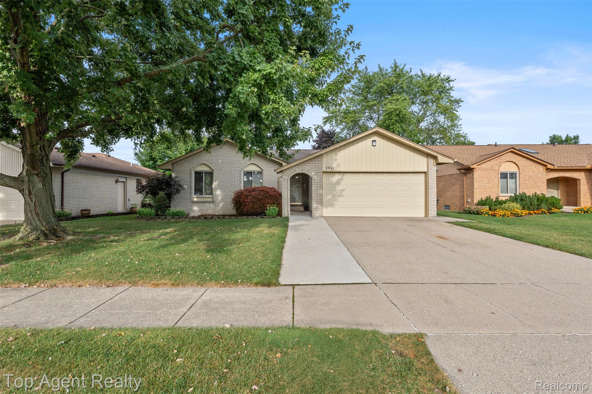 1351 Milverton Road Troy, MI 48083 - Photo 1 of 42 Single story home with a garage, brick siding, driveway, and a front lawn