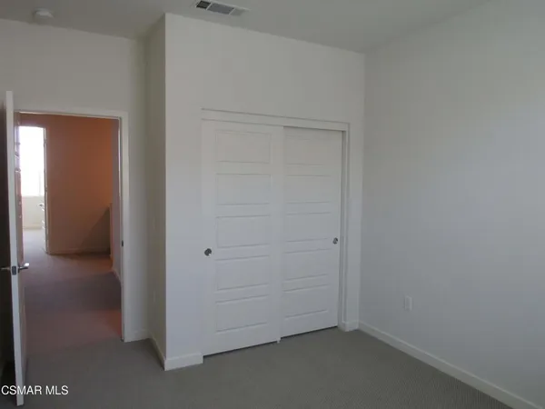 an empty room with closet