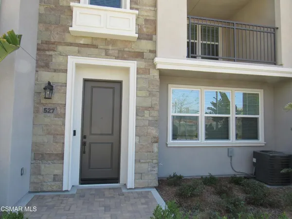 a view of staircase with white walls