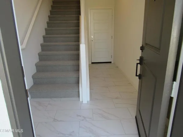 a view of bathroom and a window