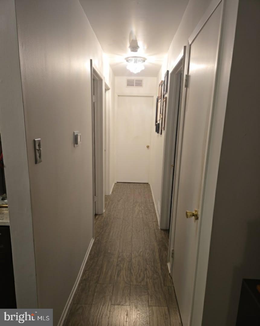 407 Harrier Row Marlton, NJ 08053 - Photo 8 of 13 a view of a hallway with wooden floor