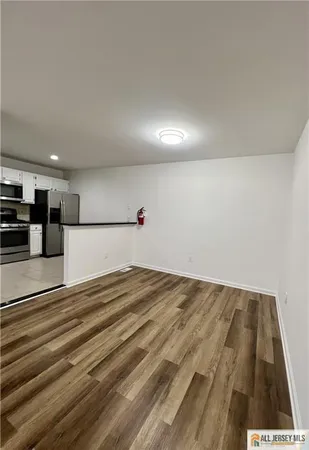 a view of a room with kitchen island