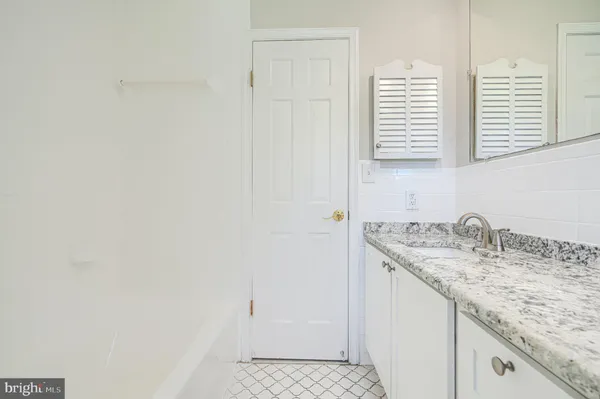 a view of a room with wooden walls
