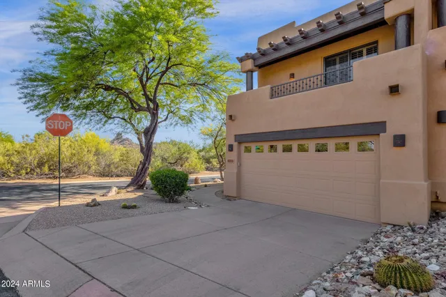 a house with trees in front of it