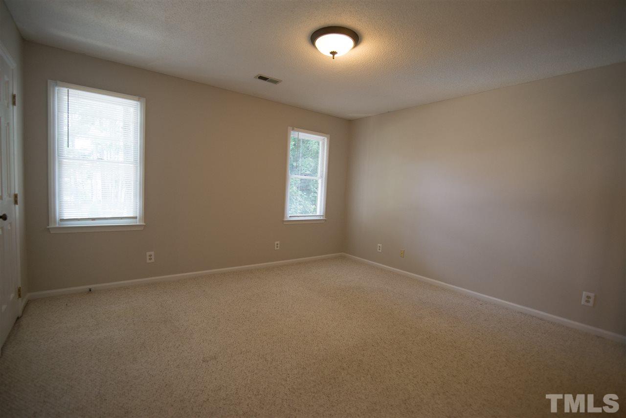 5624 Darrow Drive Raleigh, NC 27612 - Photo 11 of 21 This master suite offers a nice view of trees and the community pool.