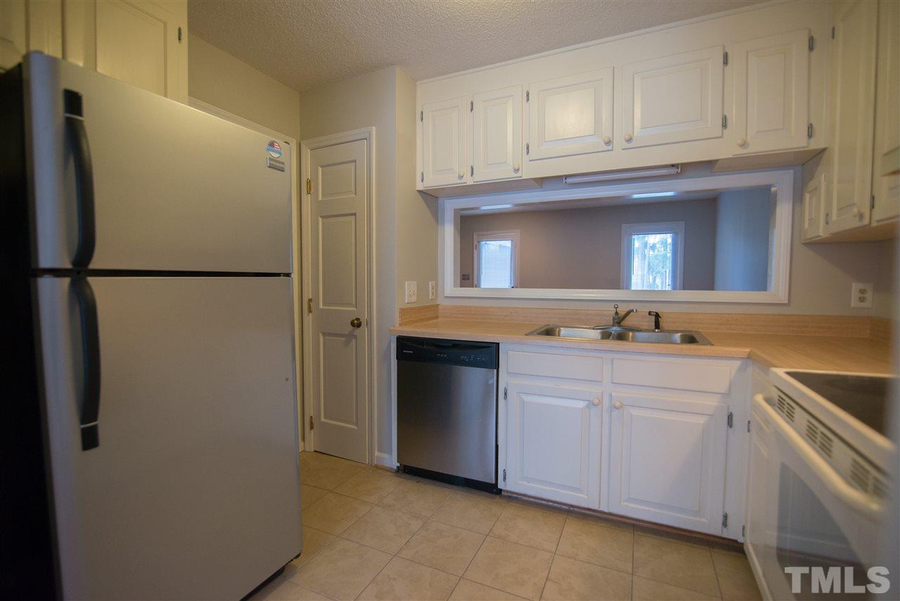 5624 Darrow Drive Raleigh, NC 27612 - Photo 3 of 21 Stainless steel refrigerator conveys!