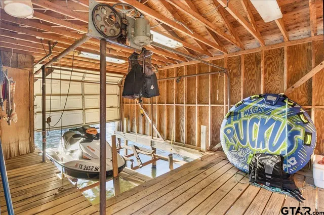 a view of a balcony with chairs