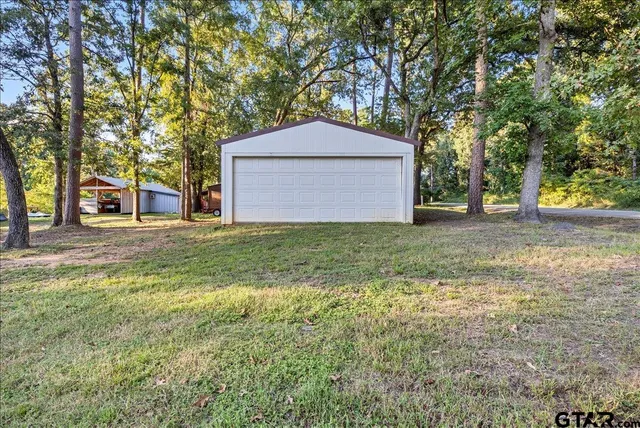 a house with trees in front of it