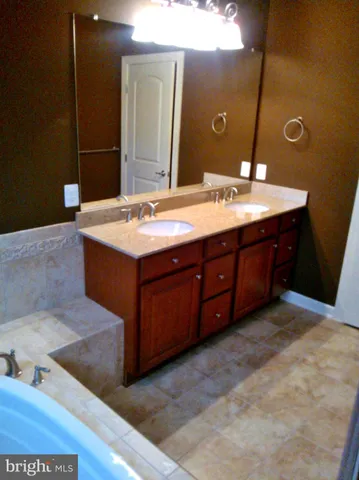 a view of empty room with a fireplace