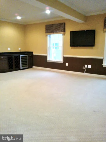 a view of a livingroom with a flat screen tv