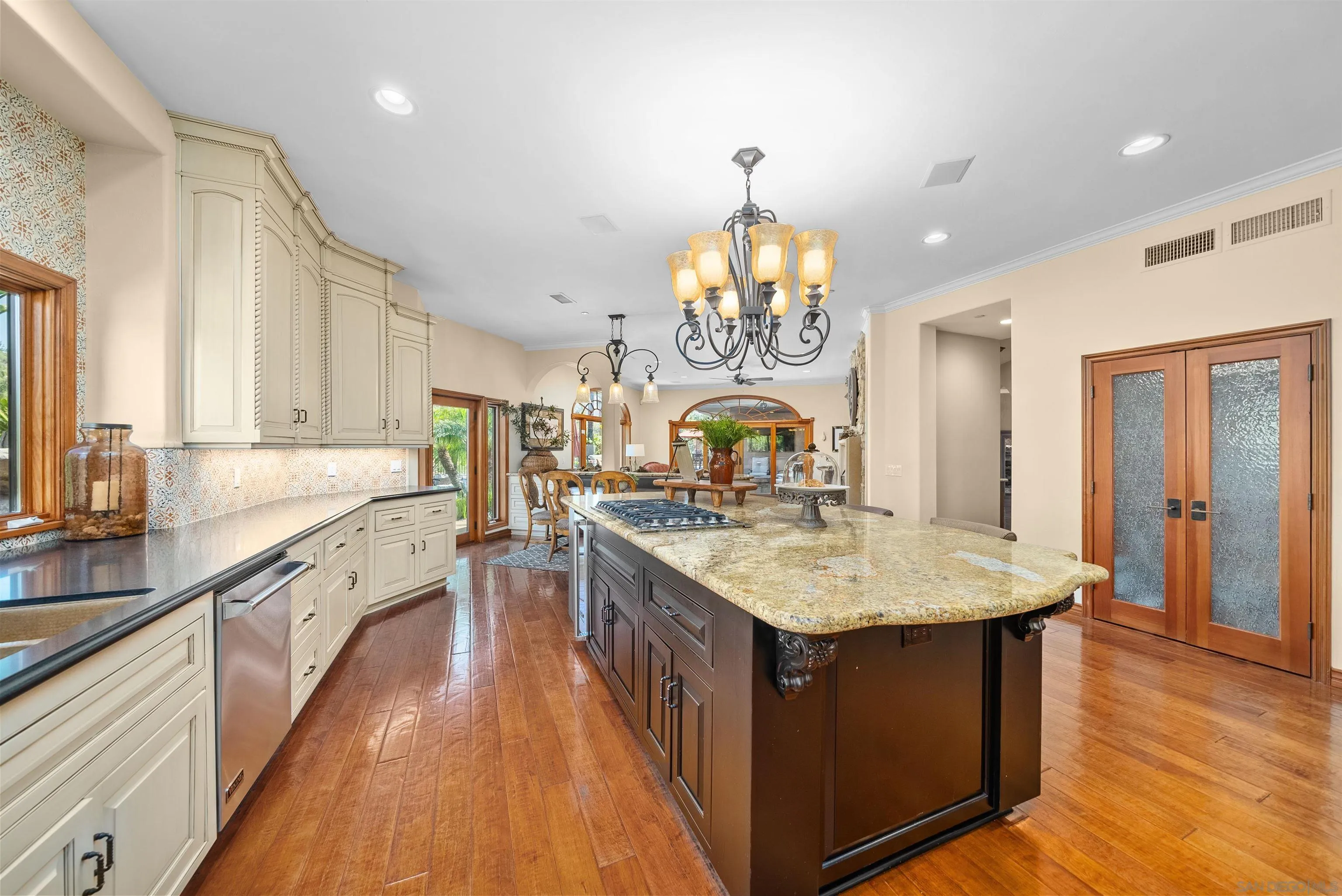 3307 Wentworth Drive Jamul, CA 91935 - Photo 14 of 75 a large kitchen with stainless steel appliances a large island in it