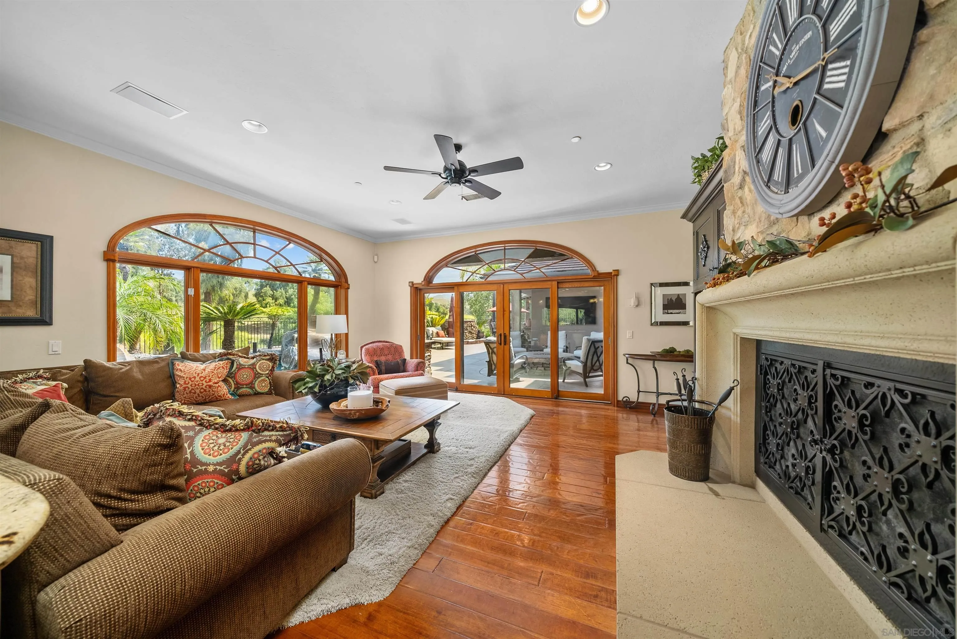 3307 Wentworth Drive Jamul, CA 91935 - Photo 17 of 75 a living room with furniture fireplace and a large window