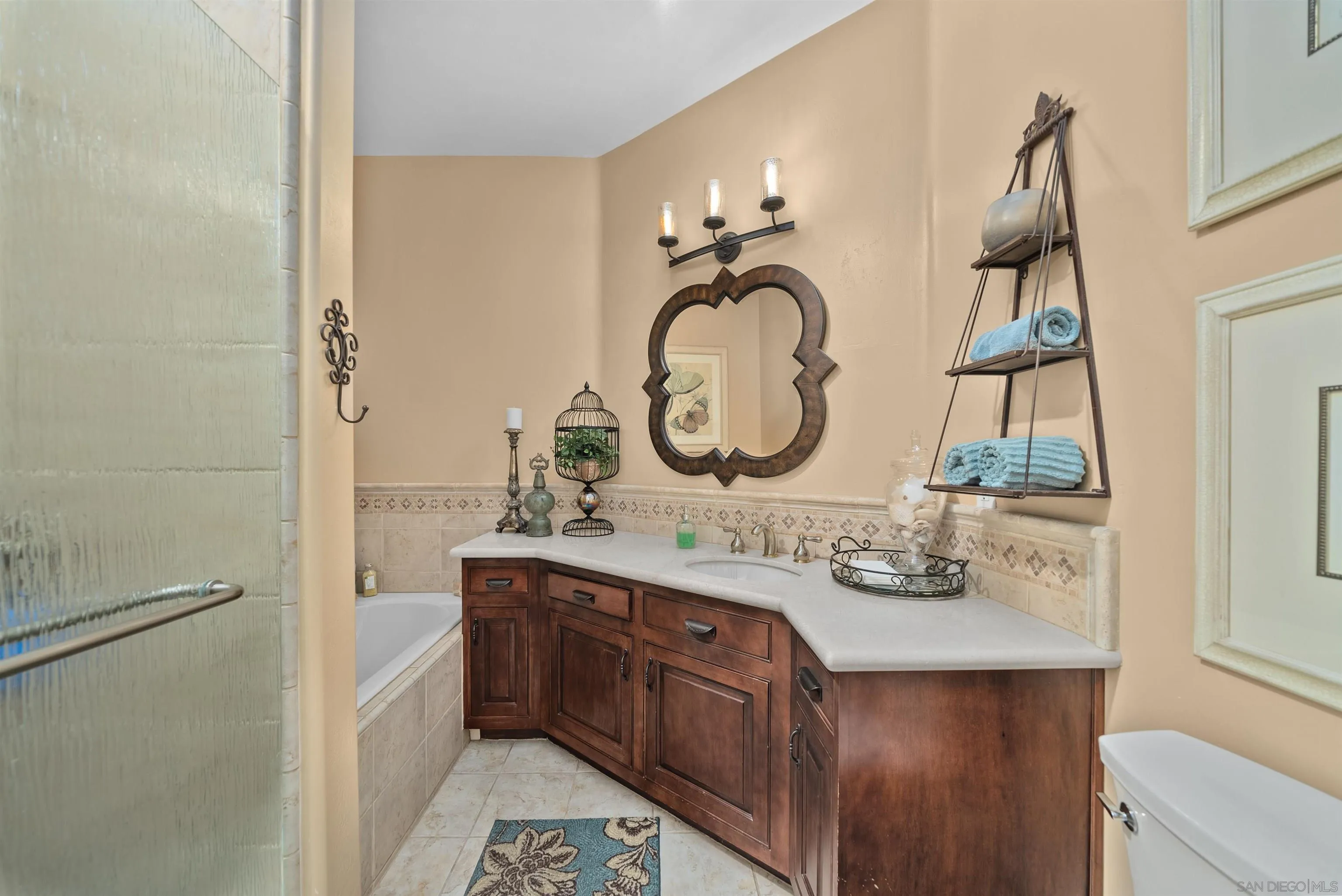 3307 Wentworth Drive Jamul, CA 91935 - Photo 20 of 75 a bathroom with a sink and a mirror