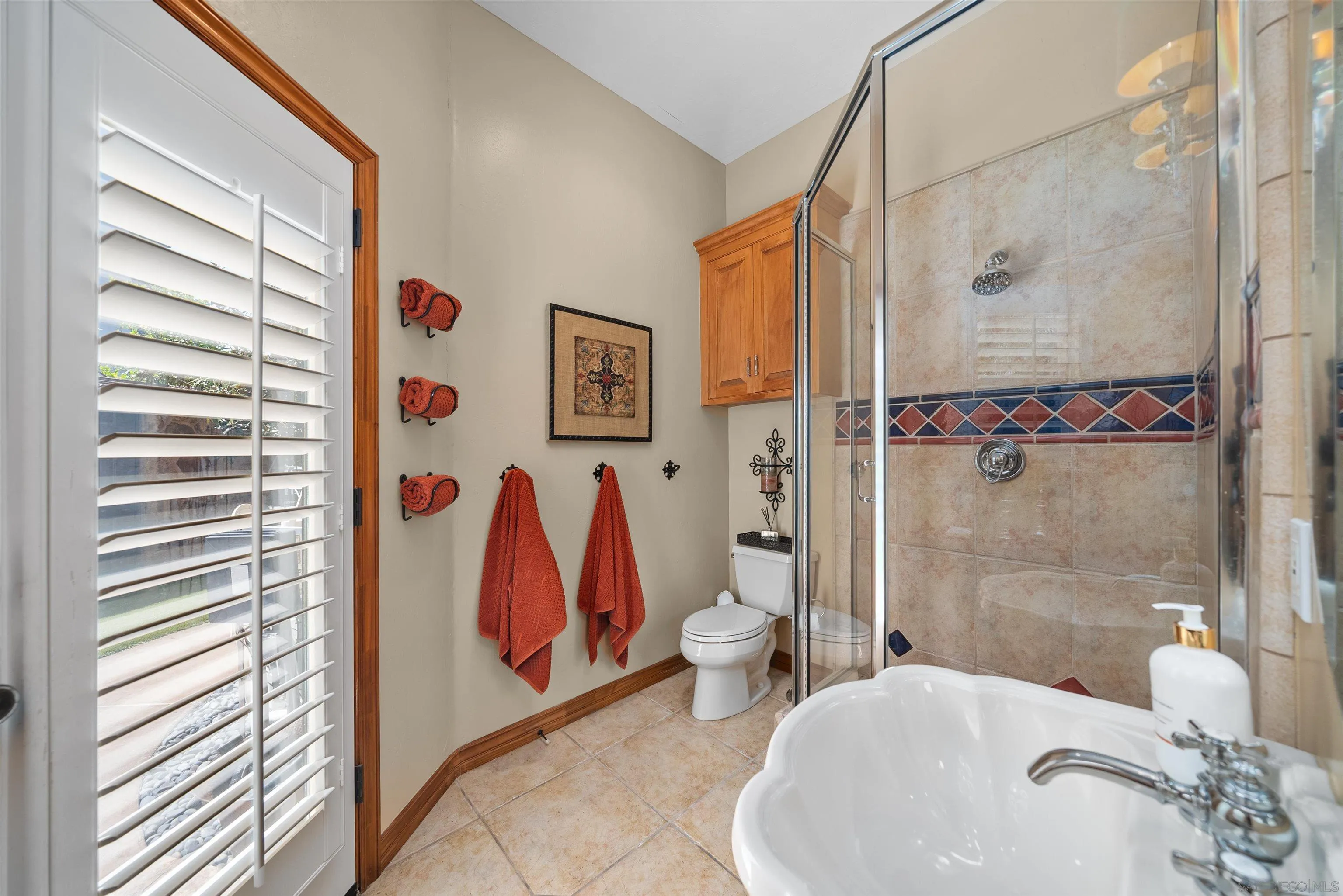 3307 Wentworth Drive Jamul, CA 91935 - Photo 30 of 75 a bathroom with a sink and mirror