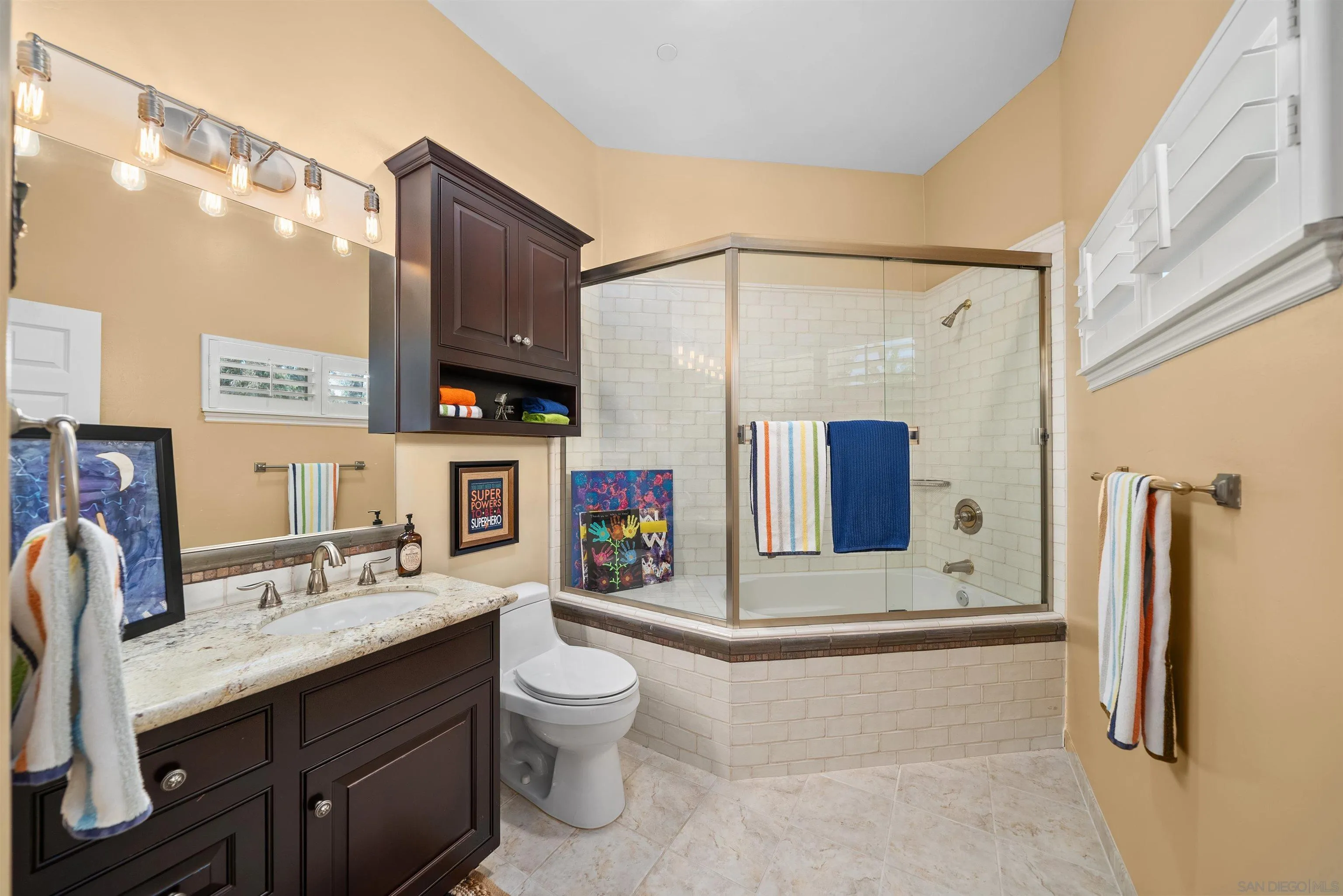 3307 Wentworth Drive Jamul, CA 91935 - Photo 46 of 75 a bathroom with a sink a toilet and a shower